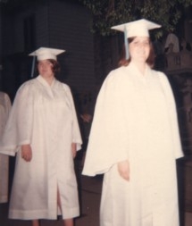 Kathleen Kelly (l) and Laura Dodge walking at graduation (Dodge album)