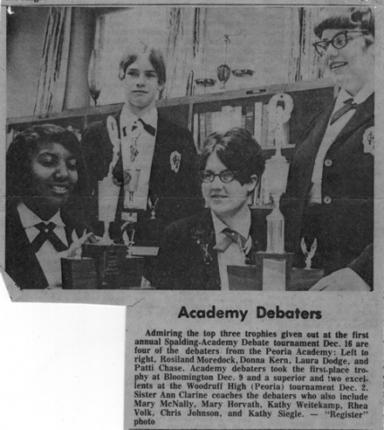 Debate Team with Trophies: Laura Dodge 2nd from right. (Are those glasses back in style?)