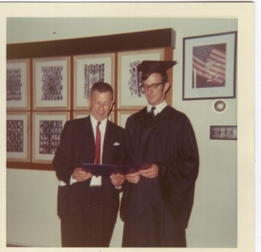 Jim Otten and his father making sure the diploma is authentic