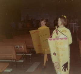 l-r: Joyce Tomlin and Deb Closen carrying Banners for Mass