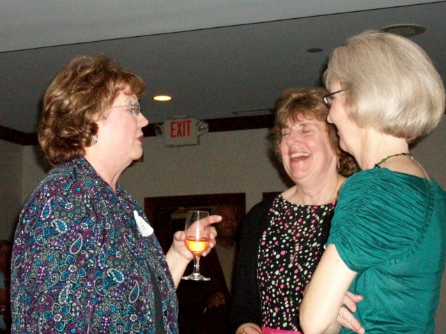 Pam Nelson Craig of Manito IL talks with Nancee Bailey Tracy of Hanover NH and Pat Rafferty Luebbers of Prior Lake MN