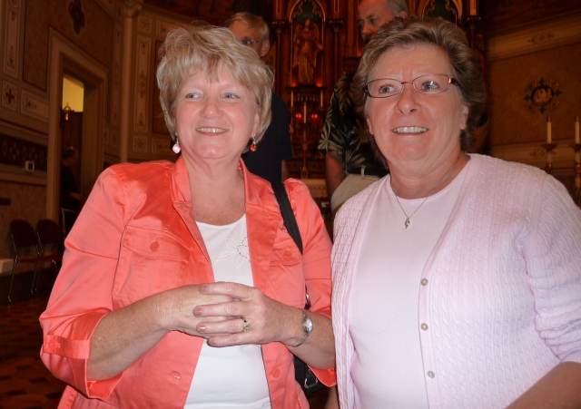 Chris Beetler Robertson and Joyce Tomlin Hasselberger reconnect at Mass